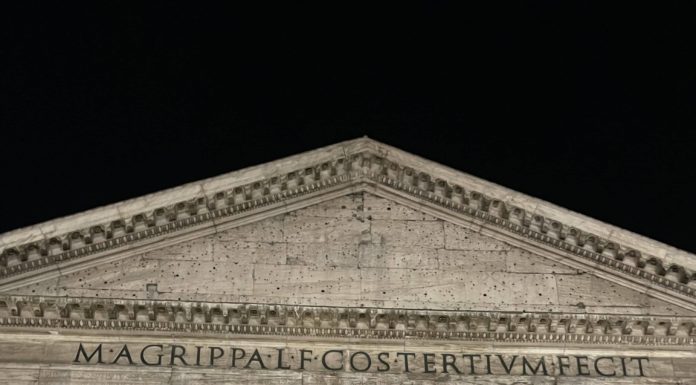The front of the Pantheon at night in Rome, Italy.